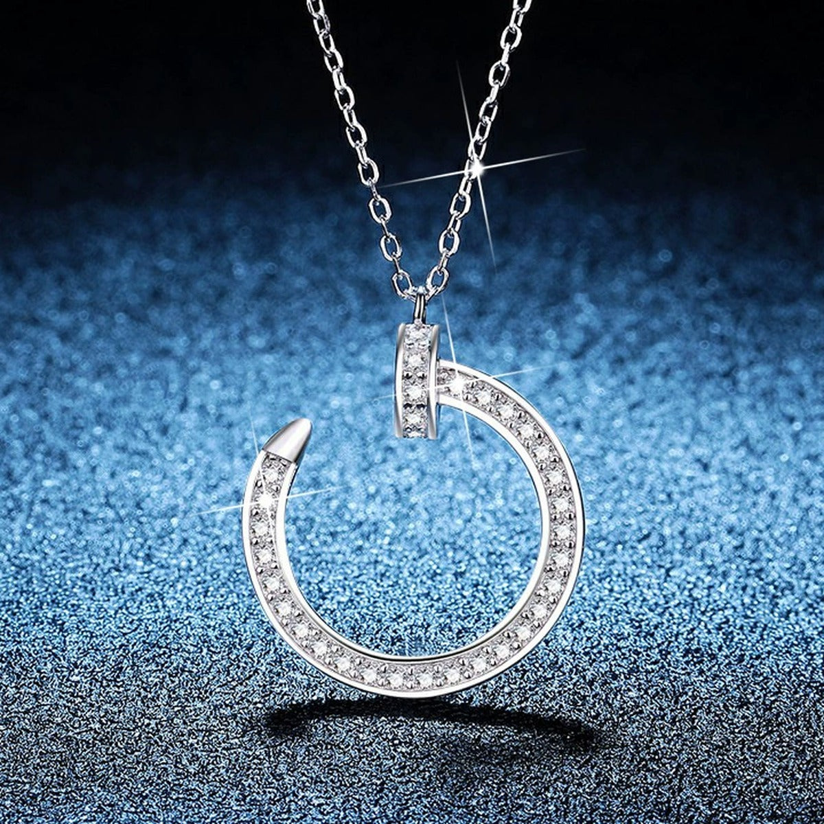 Crescent Moon Moissanite Pendant Necklace in Platinum-Plated S925 Sterling Silver blue background product view