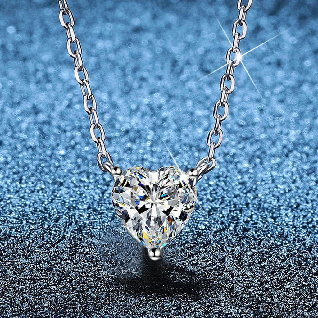 Heart Moissanite Pendant Necklace in Platinum-Plated S925 Sterling Silver blue background product view