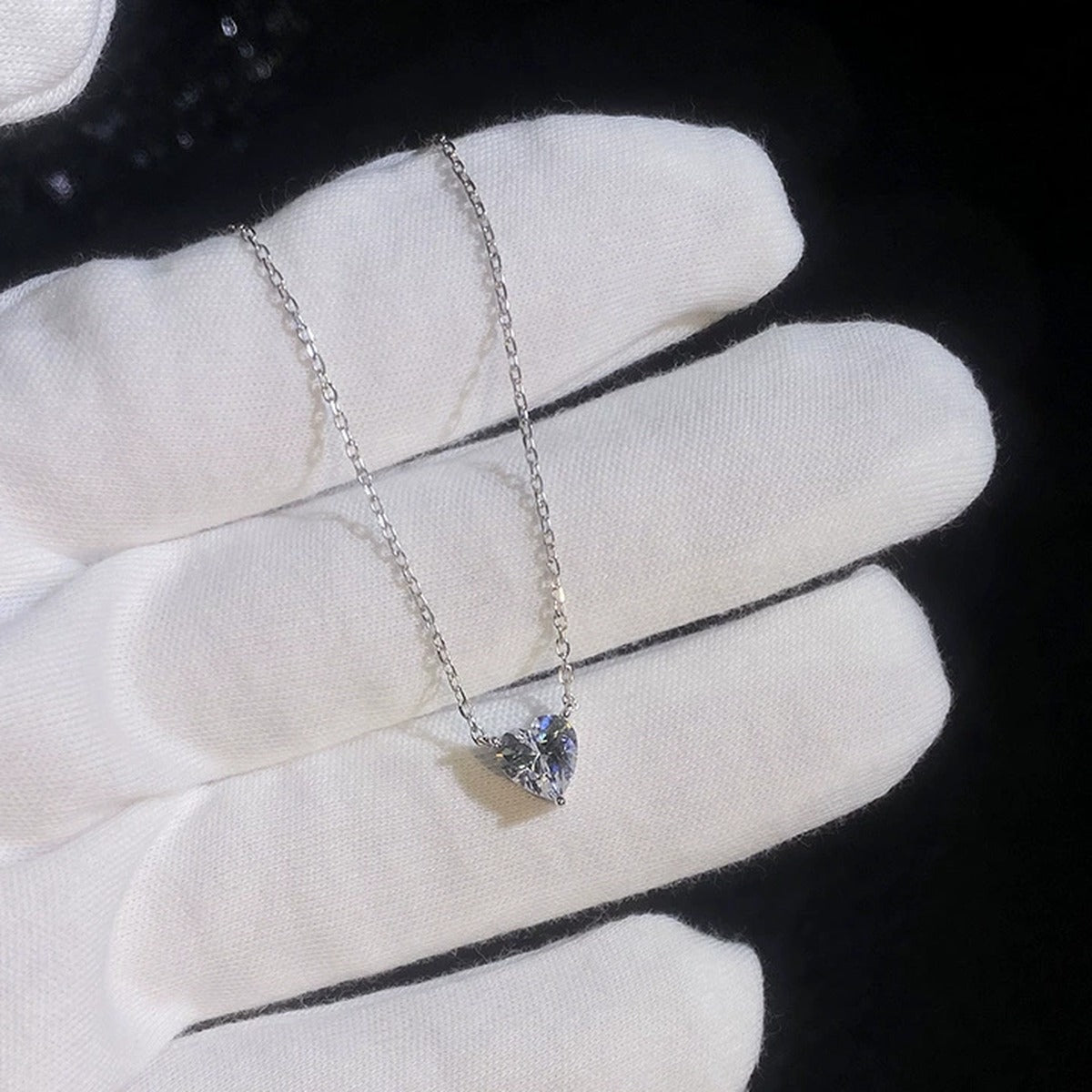 Heart Moissanite Pendant Necklace in Platinum-Plated S925 Sterling Silver dark background product display view