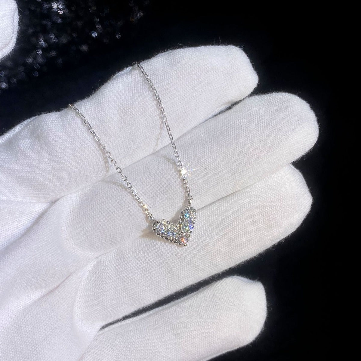 Heart Moissanite Pendant Necklace in Platinum-Plated S925 Sterling Silver dark background product display view