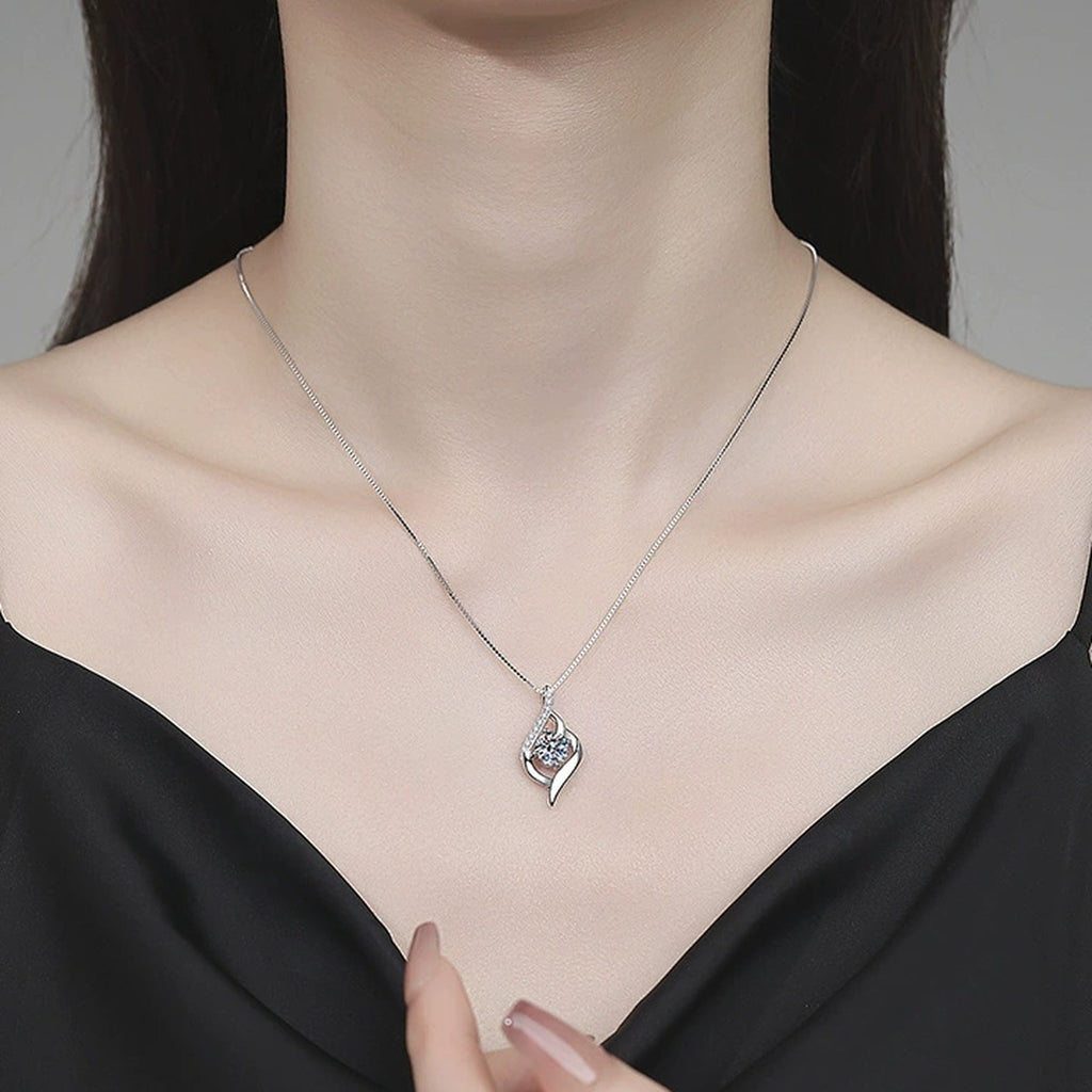 Ribbon Drop Moissanite Pendant Necklace with Cubic Zirconia in Platinum-Plated S925 Sterling Silver worn on neckline by model