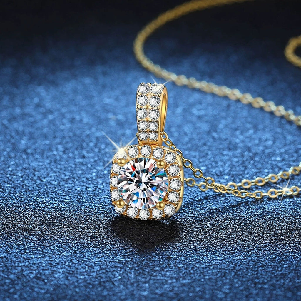 Cushion Halo Moissanite Pendant Necklace with Cubic Zirconia in 18K Yellow Gold-Plated S925 Sterling Silver blue background angled view