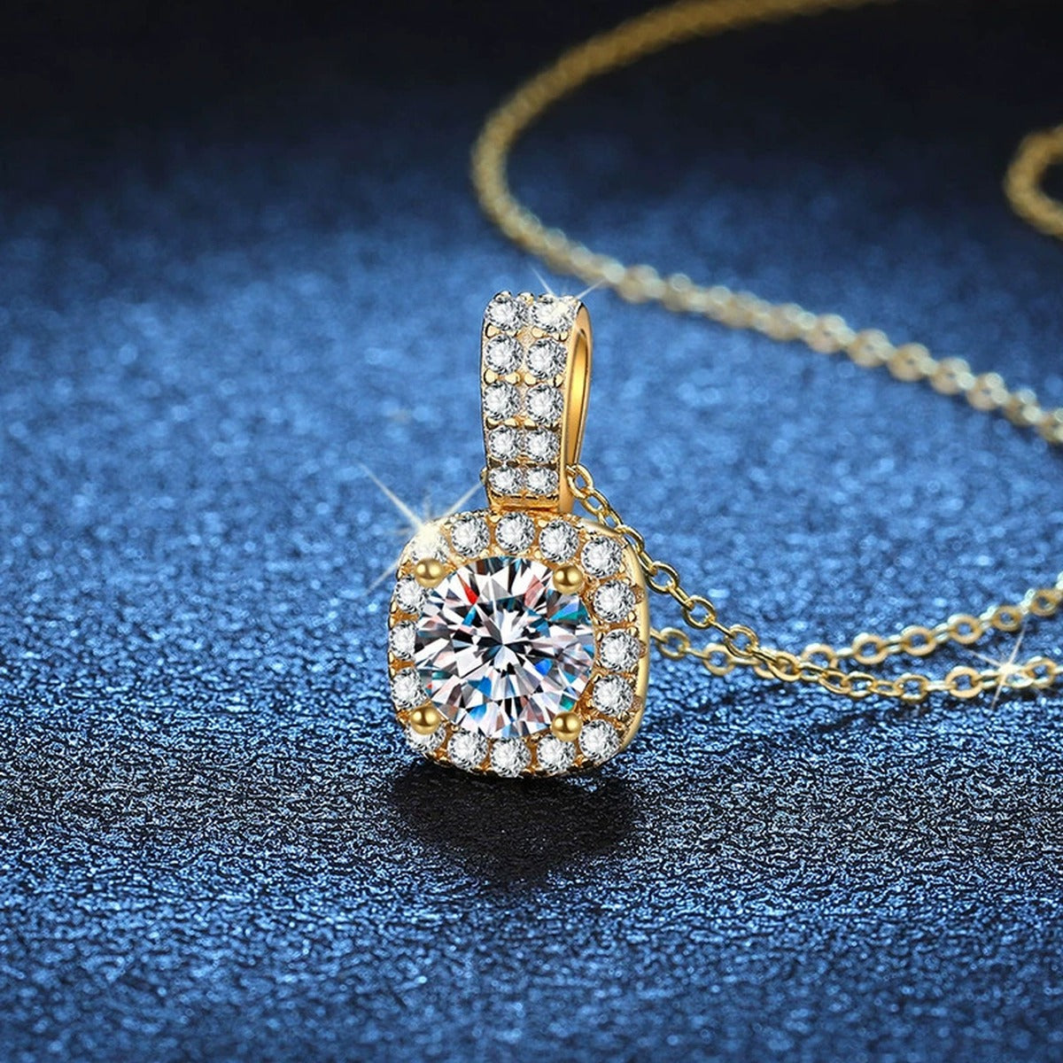 Cushion Halo Moissanite Pendant Necklace with Cubic Zirconia in 18K Yellow Gold-Plated S925 Sterling Silver blue background angled view
