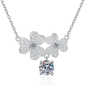 Floral Drop Moissanite Pendant Necklace with Cubic Zirconia in Platinum-Plated S925 Sterling Silver on clean white background showing the two-flower station pendant with a dangling round moissanite