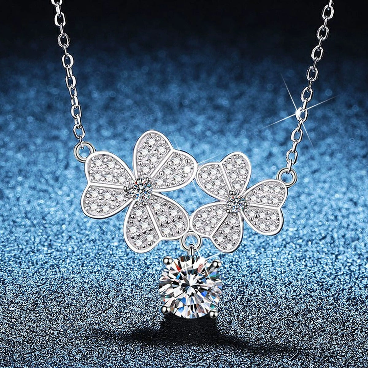 Floral Drop Moissanite Pendant Necklace with Cubic Zirconia in Platinum-Plated S925 Sterling Silver blue background product view