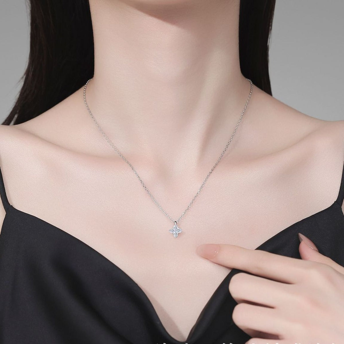 Geometric Moissanite Pendant Necklace in Platinum-Plated S925 Sterling Silver worn on neckline by model