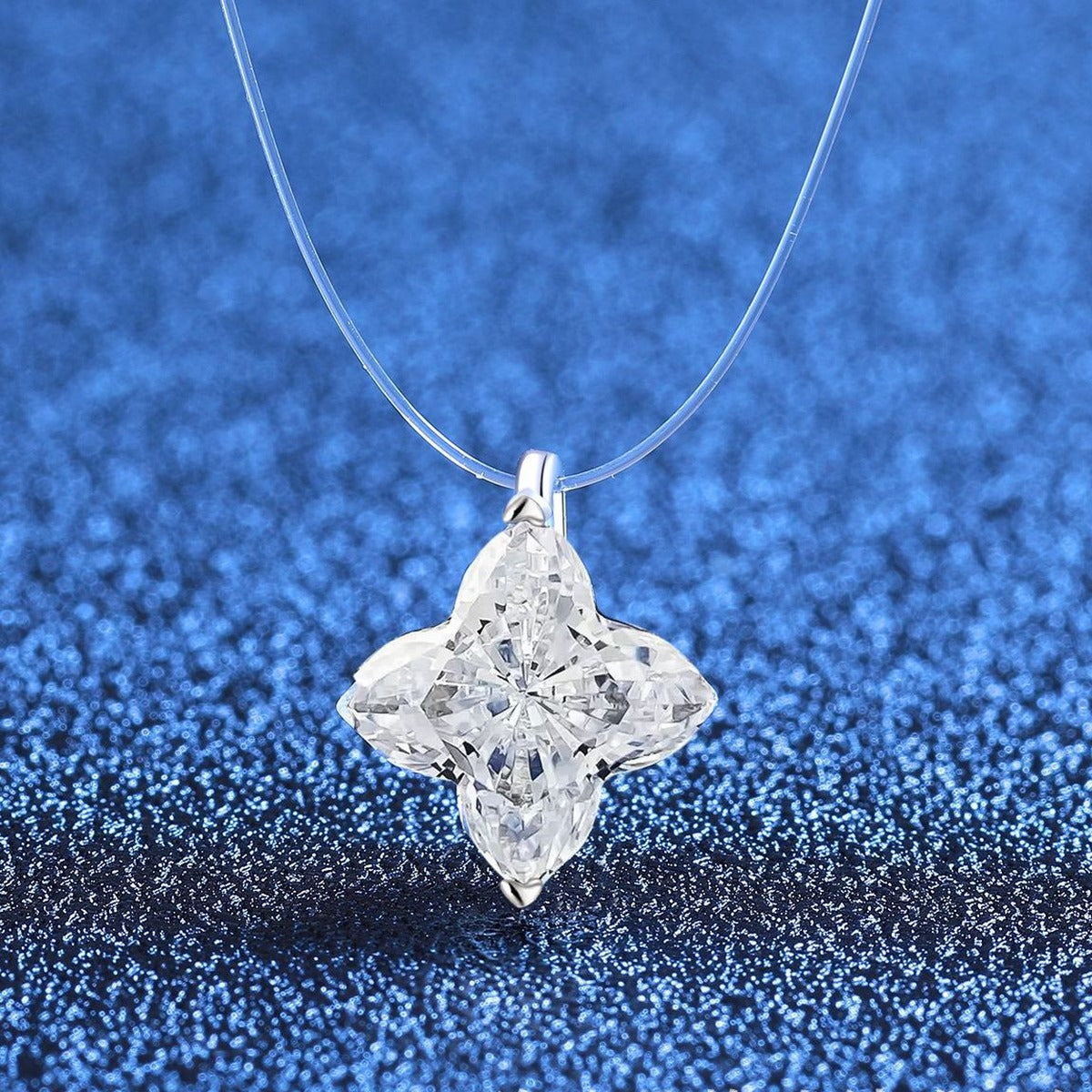Geometric Moissanite Pendant Necklace in Platinum-Plated S925 Sterling Silver blue background close-up view