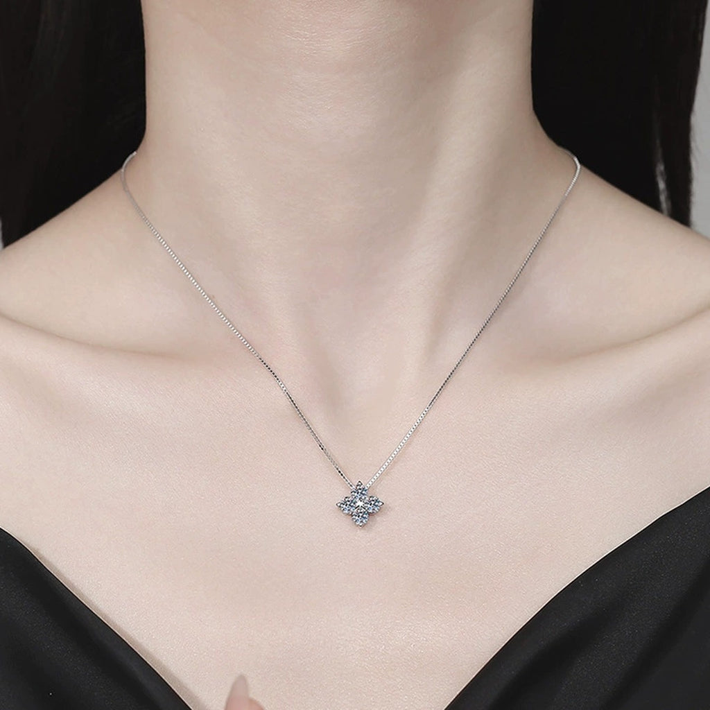 Clover Moissanite Pendant Necklace in Platinum-Plated S925 Sterling Silver worn on neckline by model