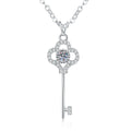 Key Moissanite Pendant Necklace with Cubic Zirconia in Platinum-Plated S925 Sterling Silver on clean white background showing the key pendant with a clover bow and round moissanite center