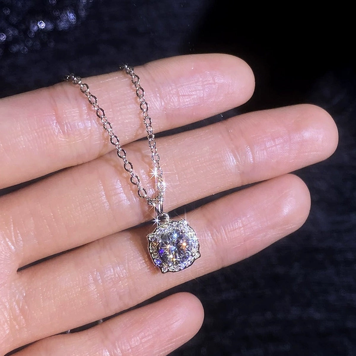 Cushion Halo Moissanite Pendant Necklace with Cubic Zirconia in Platinum-Plated S925 Sterling Silver worn on neckline by model