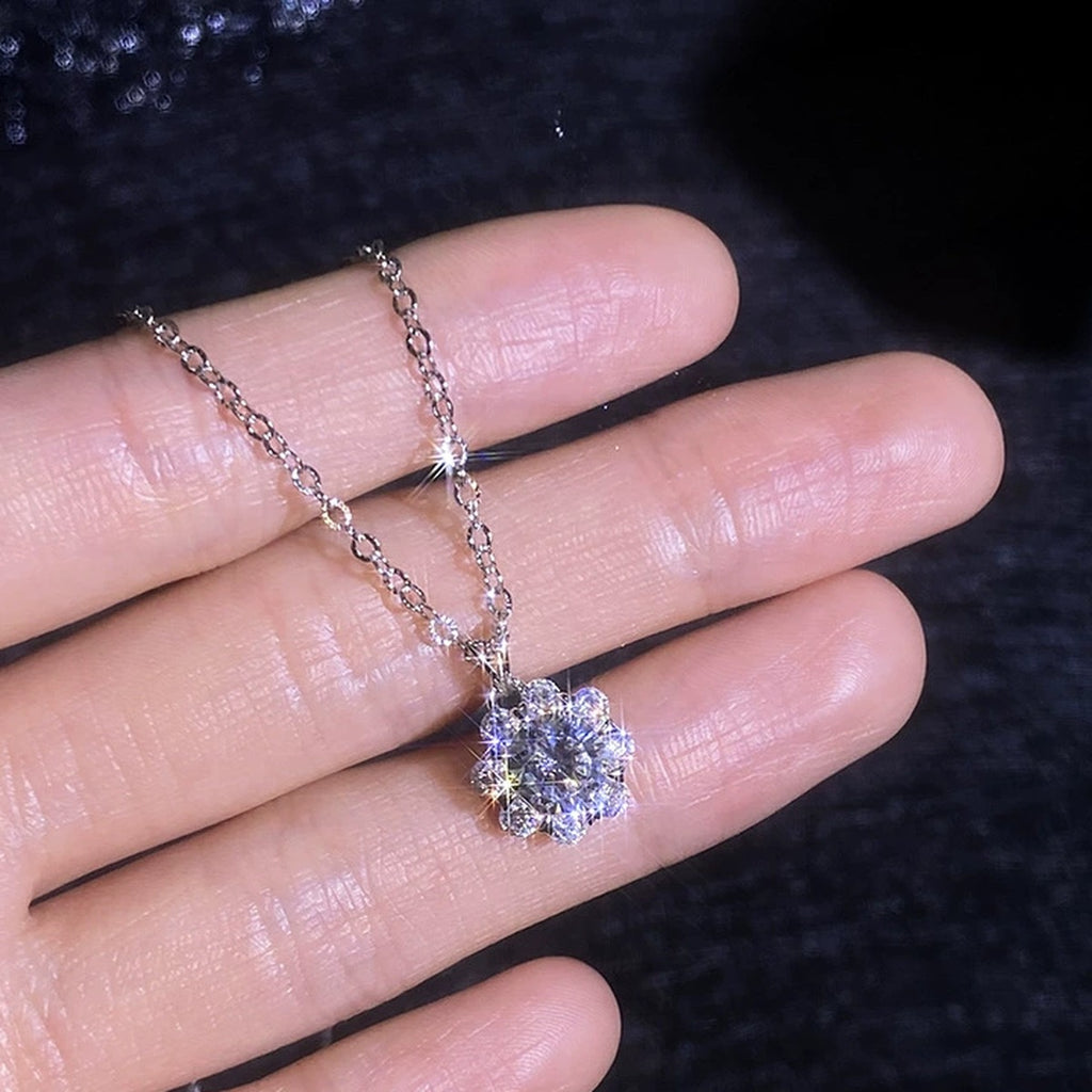 Floral Halo Moissanite Pendant Necklace with Cubic Zirconia in Platinum-Plated S925 Sterling Silver worn on neckline by model