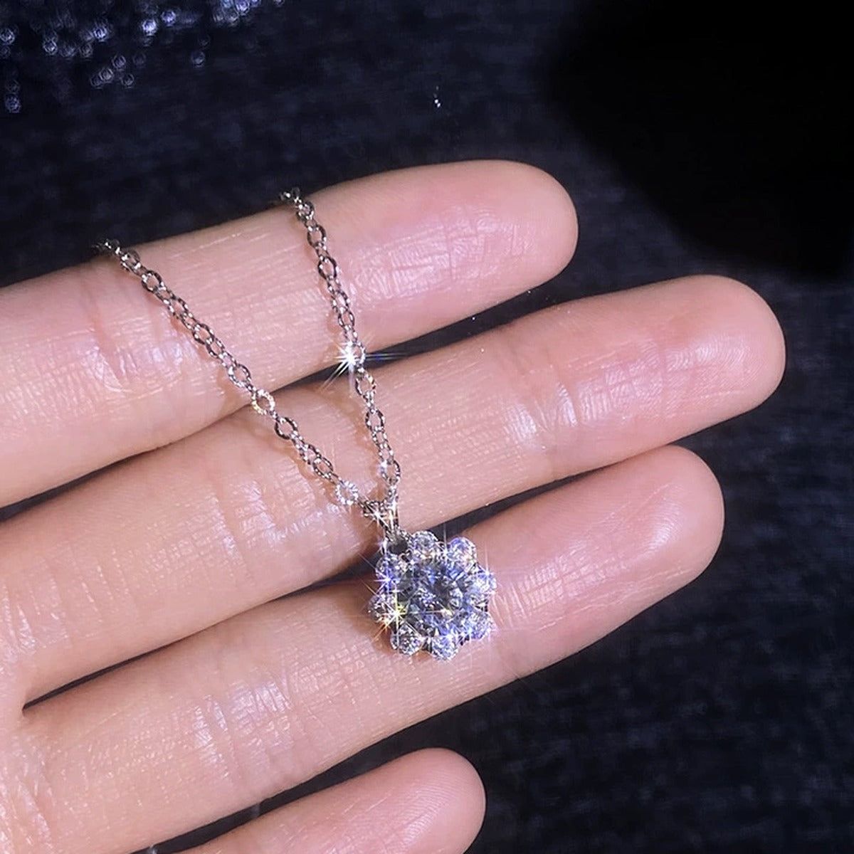 Floral Halo Moissanite Pendant Necklace with Cubic Zirconia in Platinum-Plated S925 Sterling Silver worn on neckline by model