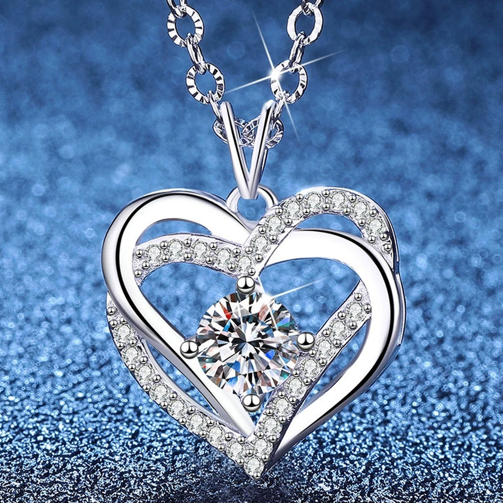 Heart Halo Moissanite Pendant Necklace with Cubic Zirconia in Platinum-Plated S925 Sterling Silver blue background product view