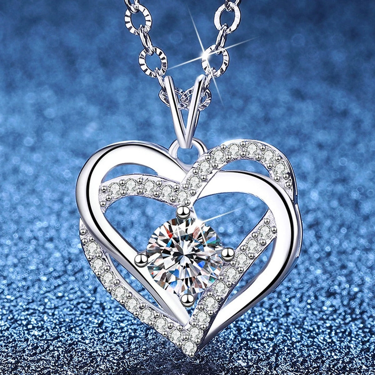 Heart Halo Moissanite Pendant Necklace with Cubic Zirconia in Platinum-Plated S925 Sterling Silver blue background product view