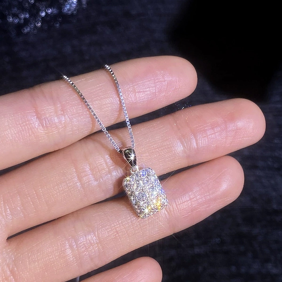 Rectangular Pavé Moissanite Pendant Necklace with Cubic Zirconia in Platinum-Plated S925 Sterling Silver worn on neckline by model