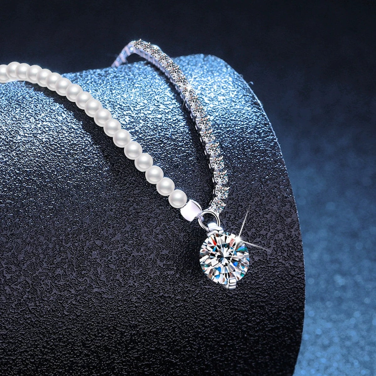 Pearl Strand Moissanite Pendant Necklace with Cubic Zirconia in Platinum-Plated S925 Sterling Silver blue background angled view