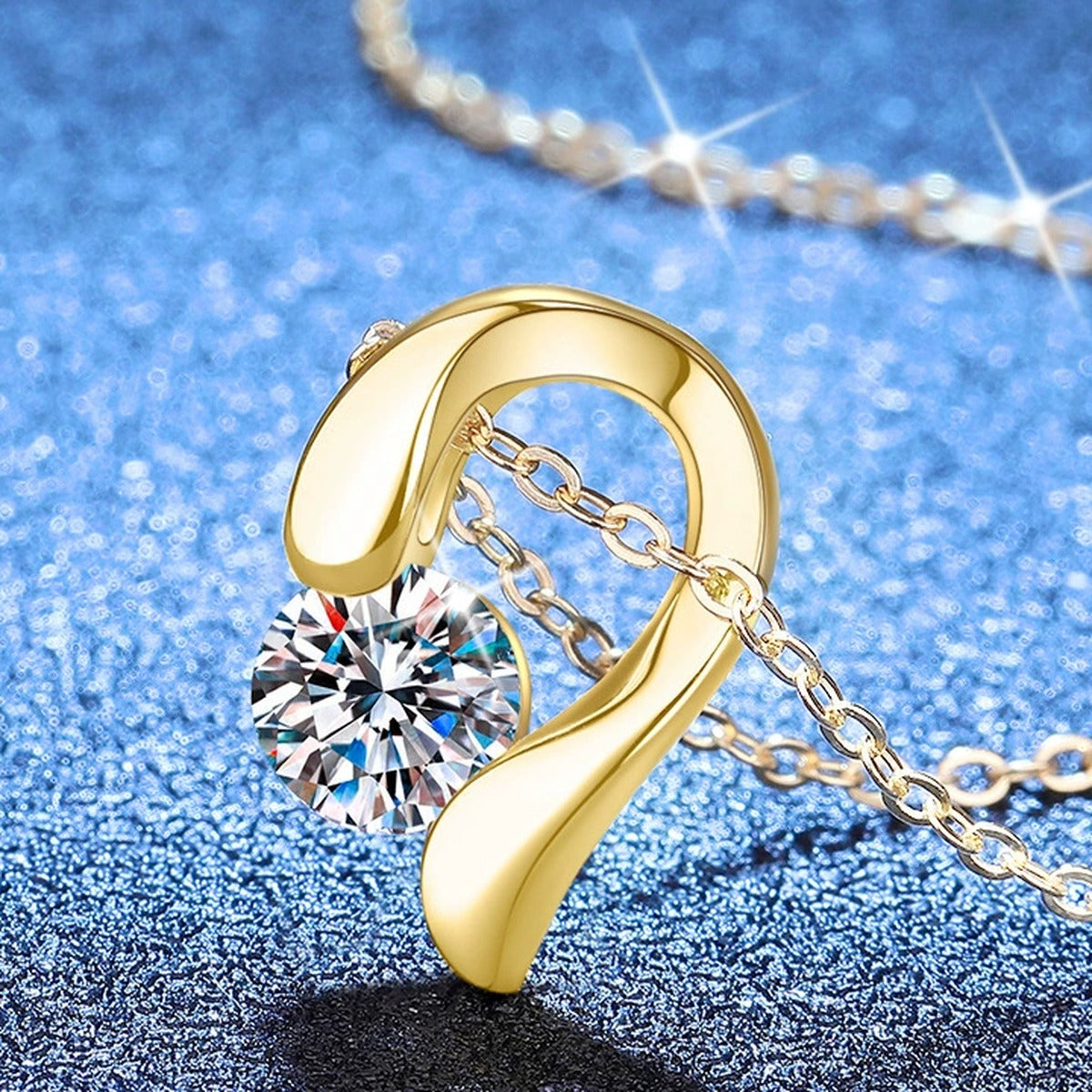Swirl Moissanite Pendant Necklace in S925 Sterling Silver blue background angled view