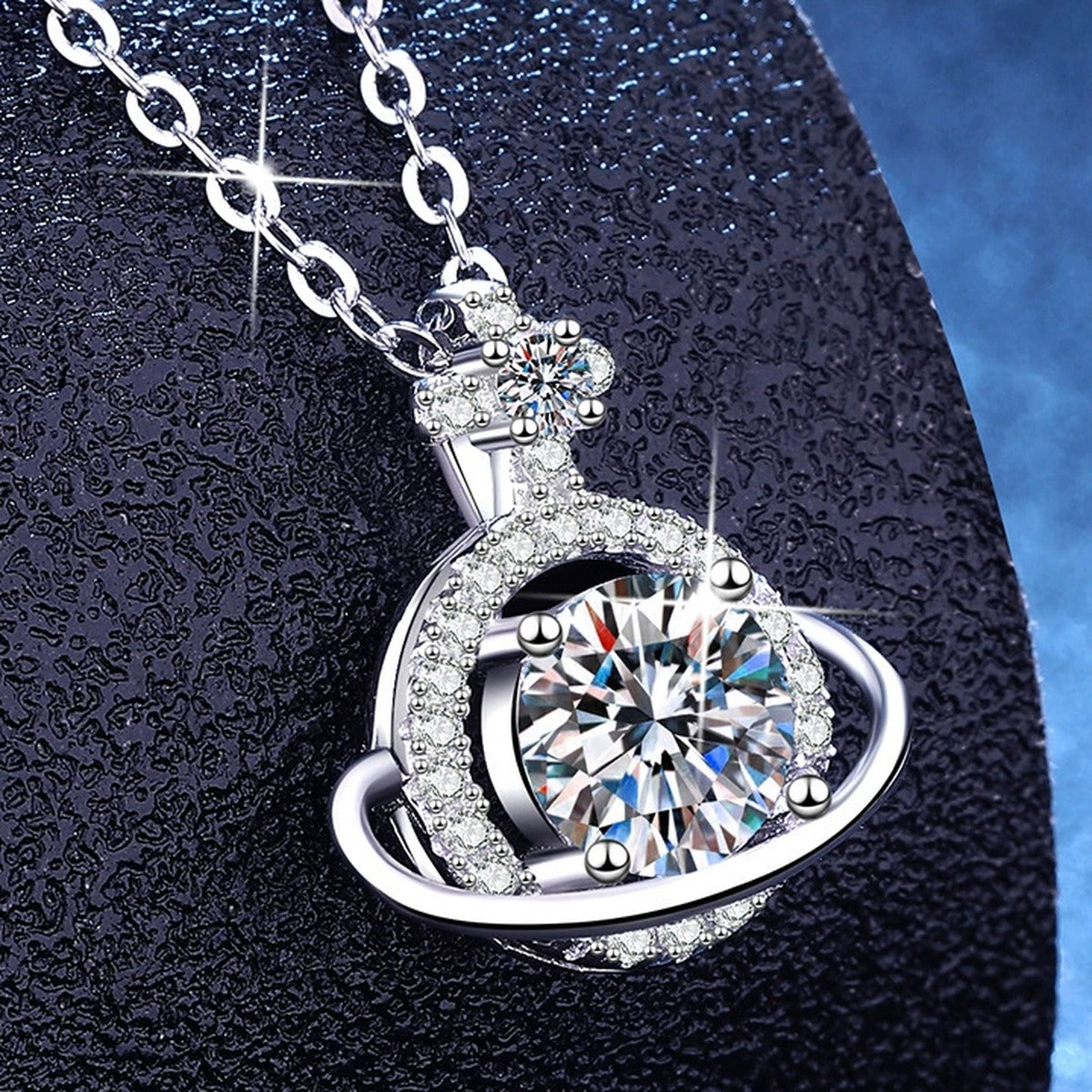 Saturn Halo Moissanite Pendant Necklace with Cubic Zirconia in Platinum-Plated S925 Sterling Silver dark background product display view