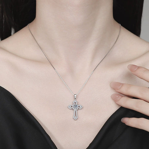 Cross Moissanite Pendant Necklace with Cubic Zirconia in Platinum-Plated S925 Sterling Silver worn on neckline by model