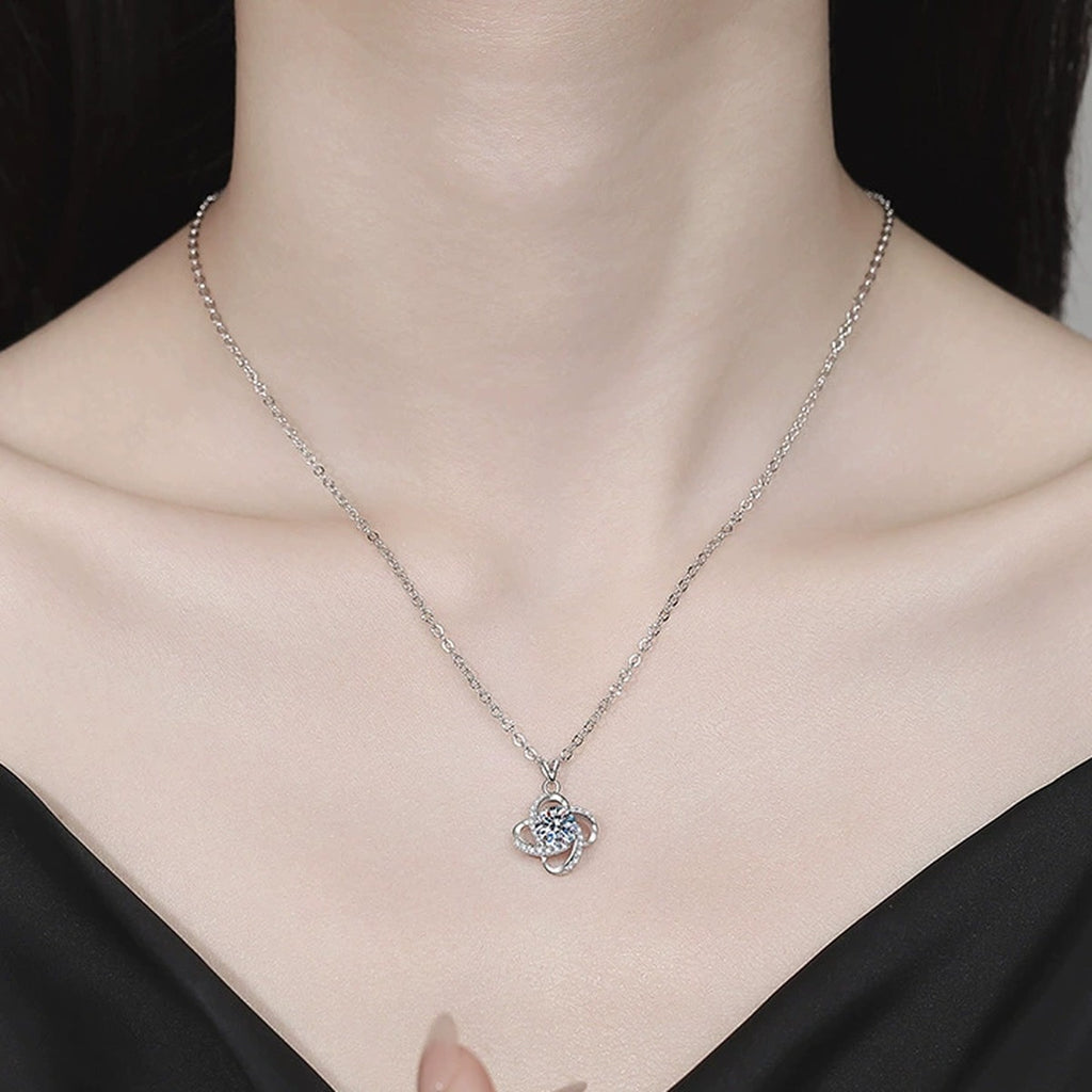 Floral Halo Moissanite Pendant Necklace with Cubic Zirconia in Platinum-Plated S925 Sterling Silver worn on neckline by model