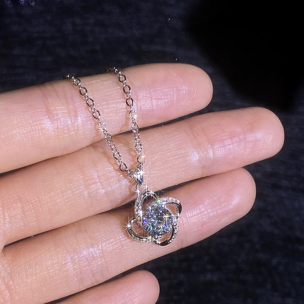 Floral Halo Moissanite Pendant Necklace with Cubic Zirconia in Platinum-Plated S925 Sterling Silver worn on neckline by model