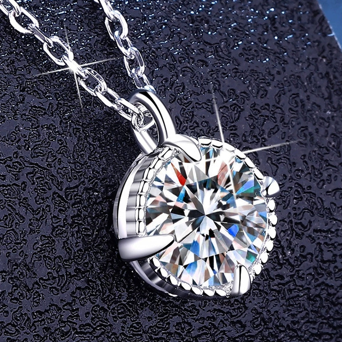 Solitaire Moissanite Pendant Necklace in Platinum-Plated S925 Sterling Silver dark background product display view