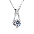 Teardrop Moissanite Pendant Necklace with Cubic Zirconia in Platinum-Plated S925 Sterling Silver on clean white background showing the slender teardrop pendant with a moissanite center