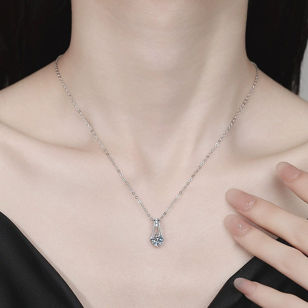 Teardrop Moissanite Pendant Necklace with Cubic Zirconia in Platinum-Plated S925 Sterling Silver worn on neckline by model