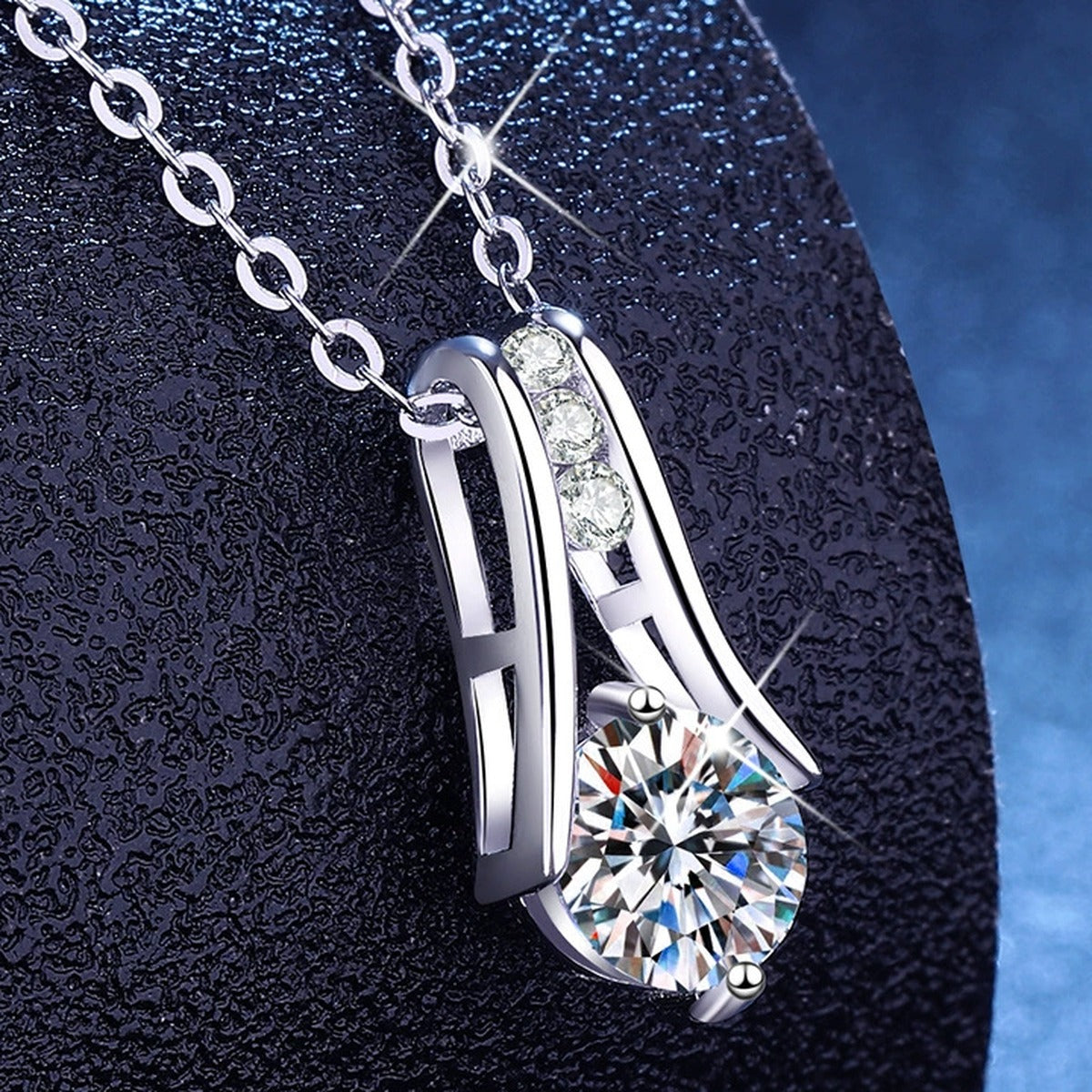 Teardrop Moissanite Pendant Necklace with Cubic Zirconia in Platinum-Plated S925 Sterling Silver blue background product view