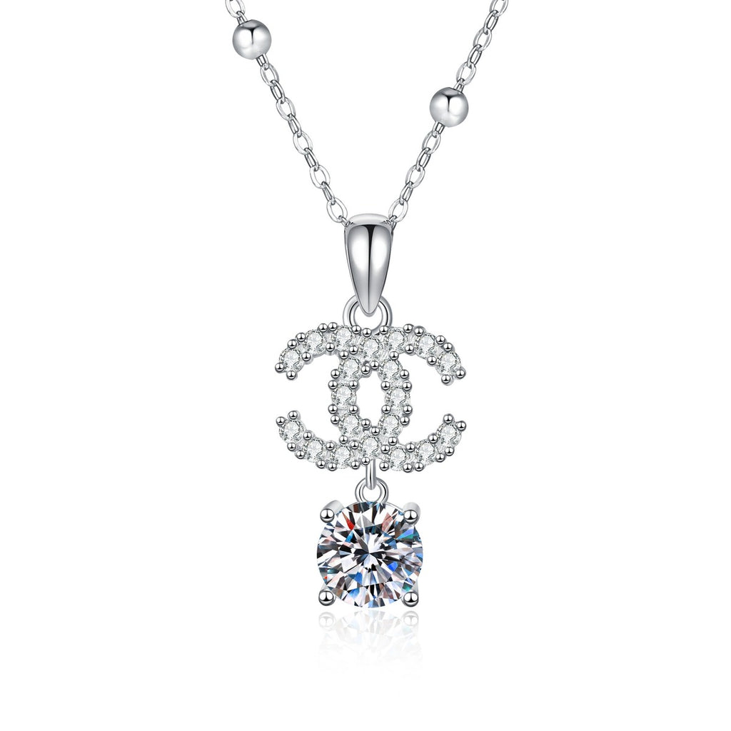 Double-C Pendant Necklace with Cubic Zirconia in Platinum-Plated S925 Sterling Silver on clean white background showing the double-C motif pendant with a dangling round moissanite