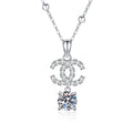 Double-C Pendant Necklace with Cubic Zirconia in Platinum-Plated S925 Sterling Silver on clean white background showing the double-C motif pendant with a dangling round moissanite