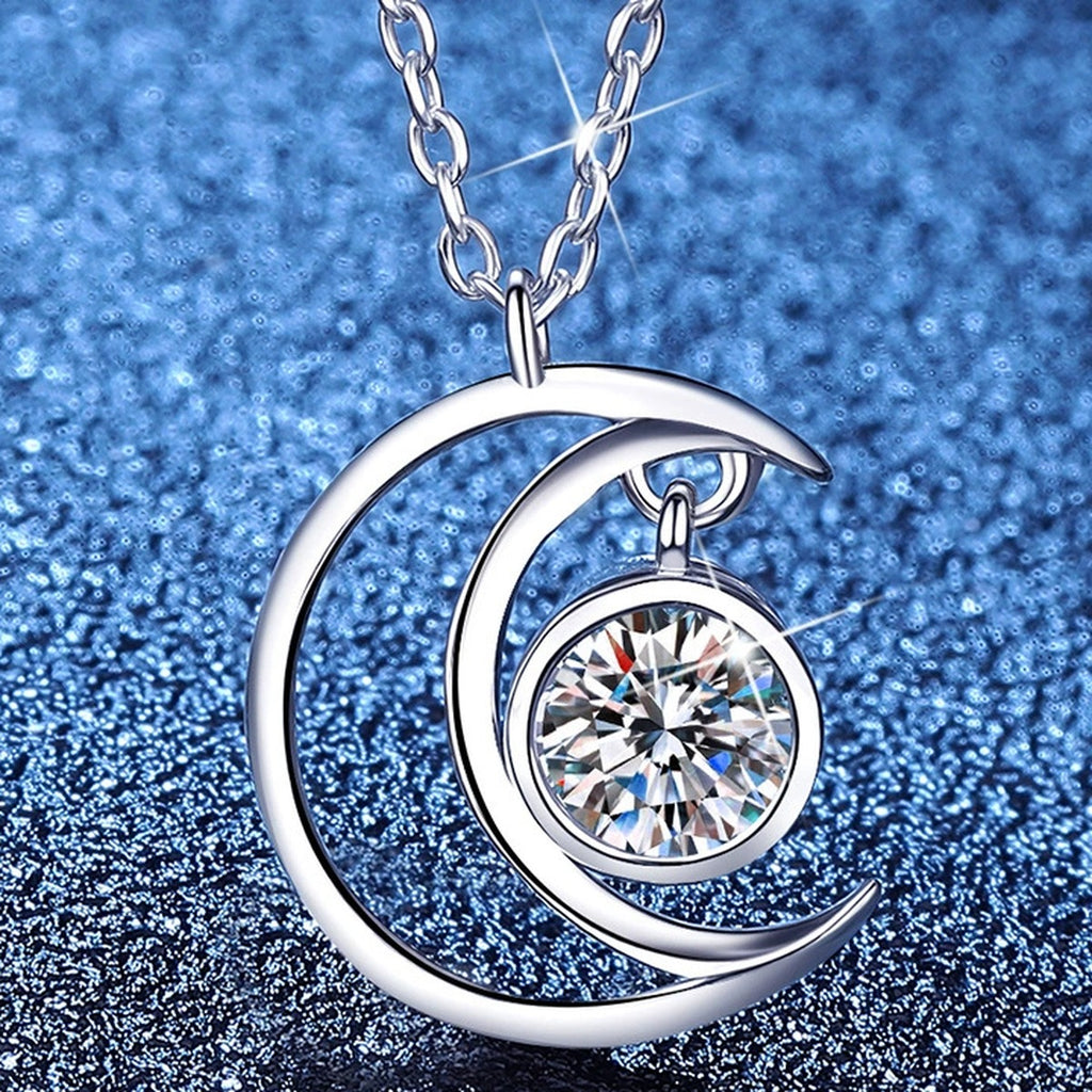 Crescent Moon Moissanite Pendant Necklace in Platinum-Plated S925 Sterling Silver blue background product view