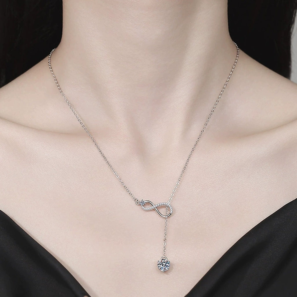 Drop Moissanite Pendant Necklace with Cubic Zirconia in Platinum-Plated S925 Sterling Silver worn on neckline by model