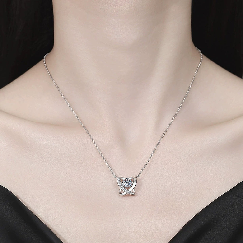 Swirl Halo Moissanite Pendant Necklace with Cubic Zirconia in Platinum-Plated S925 Sterling Silver worn on neckline by model