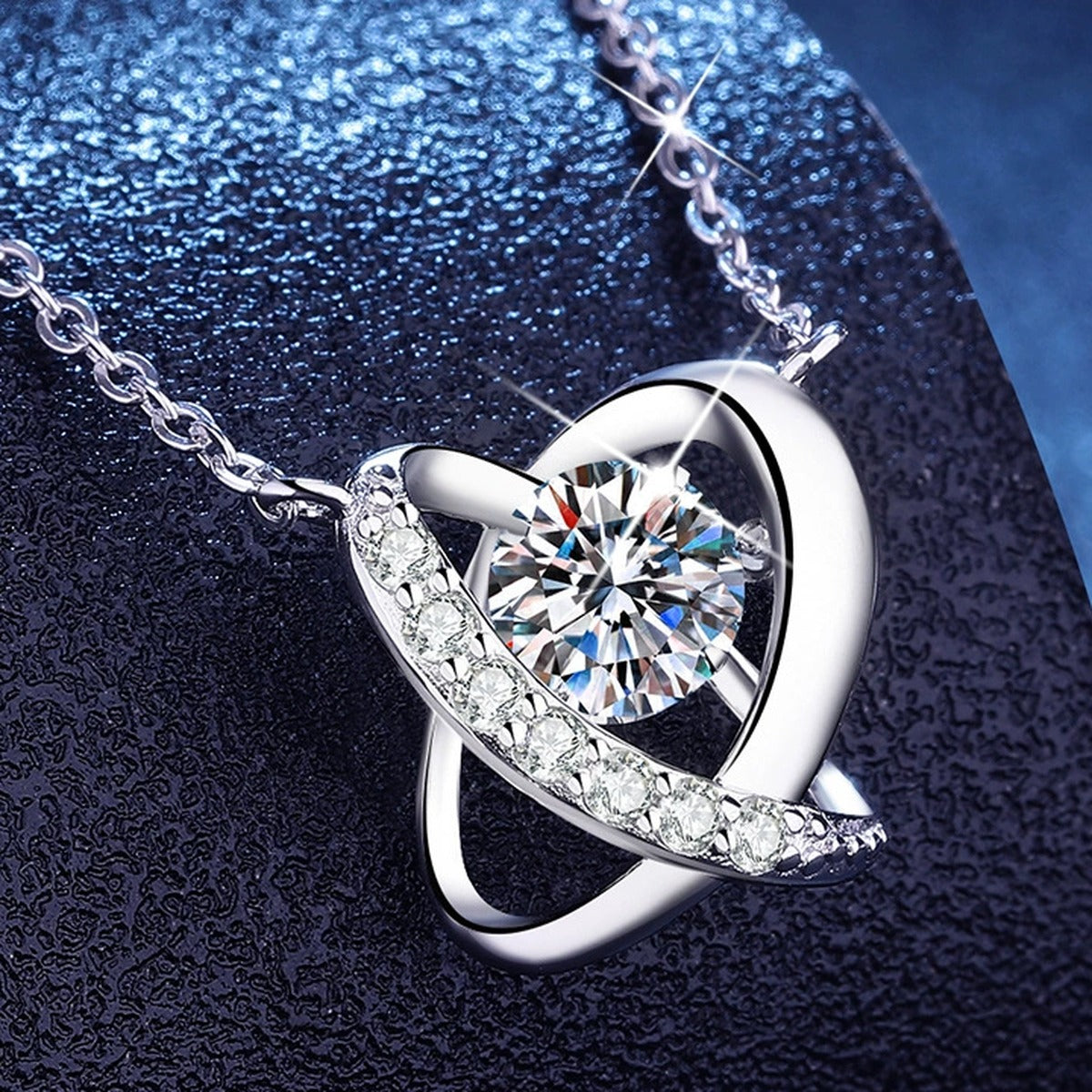 Swirl Halo Moissanite Pendant Necklace with Cubic Zirconia in Platinum-Plated S925 Sterling Silver blue background angled view