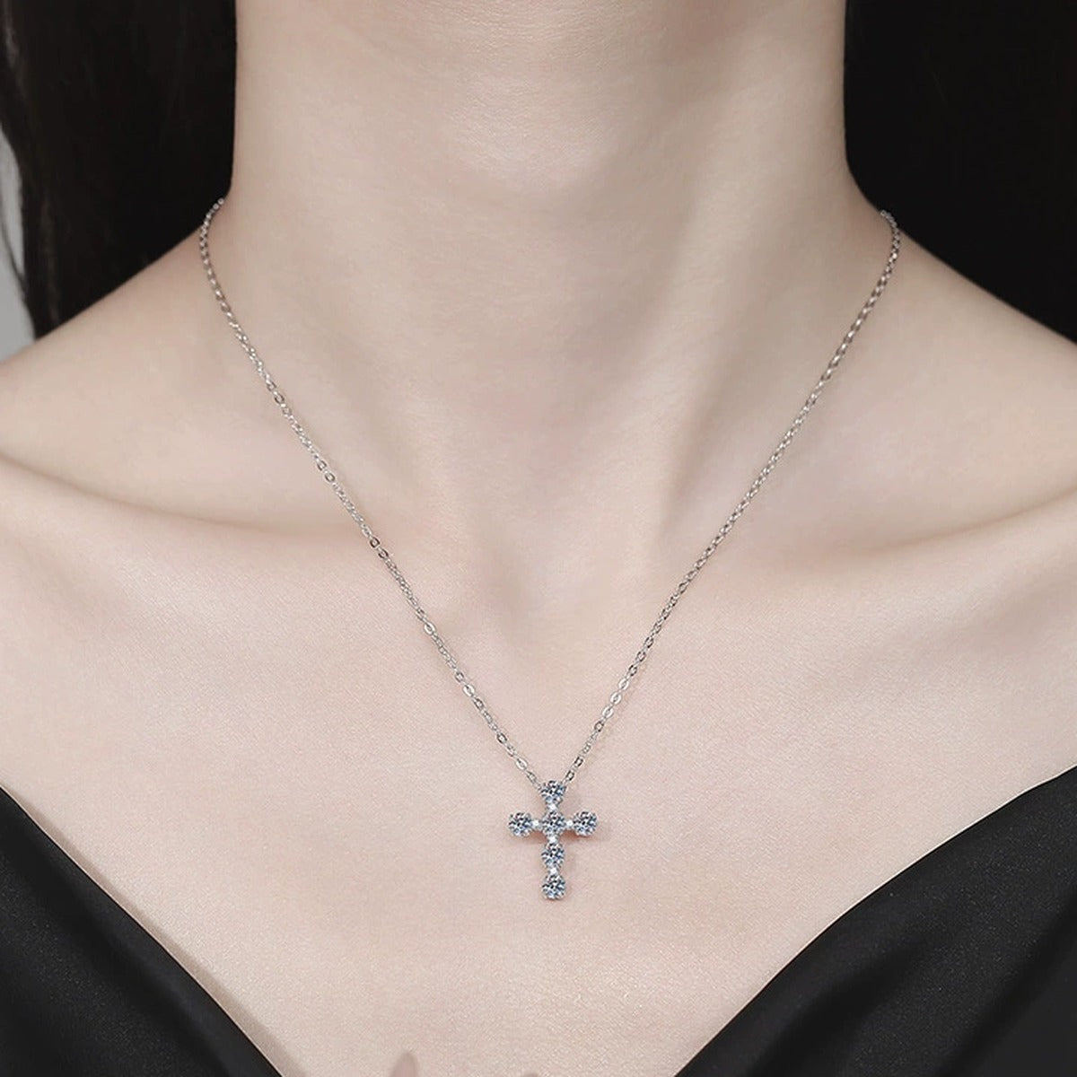 Cross Moissanite Pendant Necklace with Cubic Zirconia in Platinum-Plated S925 Sterling Silver worn on neckline by model