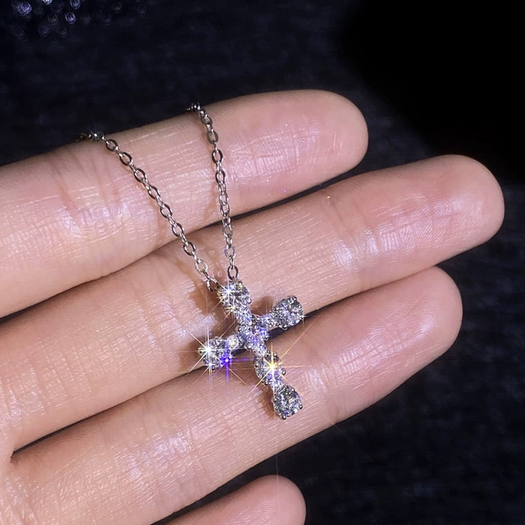 Cross Moissanite Pendant Necklace with Cubic Zirconia in Platinum-Plated S925 Sterling Silver worn on neckline by model