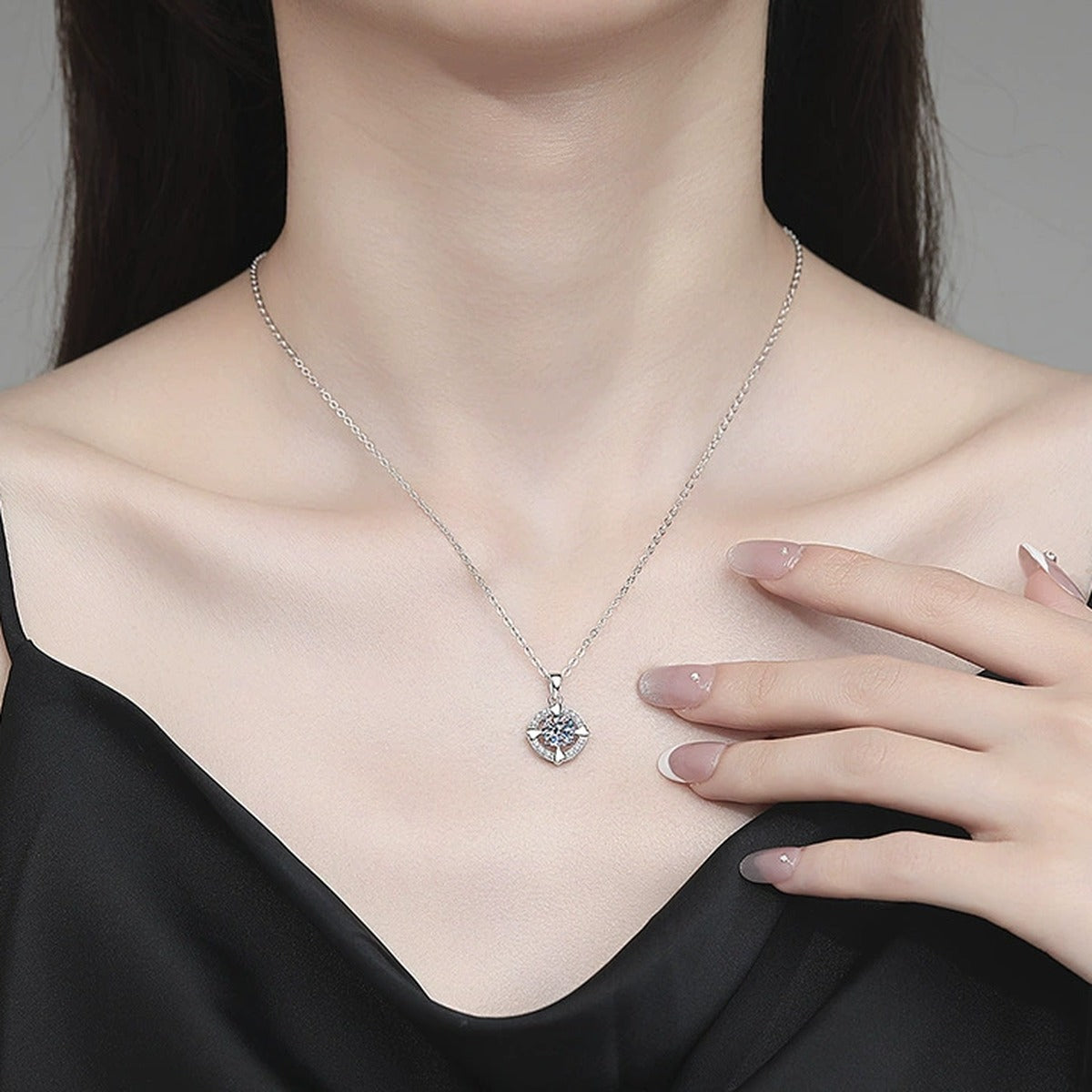 Round Halo Moissanite Pendant Necklace with Cubic Zirconia in Platinum-Plated S925 Sterling Silver worn on neckline by model