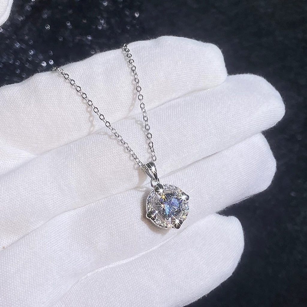 Round Halo Moissanite Pendant Necklace with Cubic Zirconia in Platinum-Plated S925 Sterling Silver dark background product display view