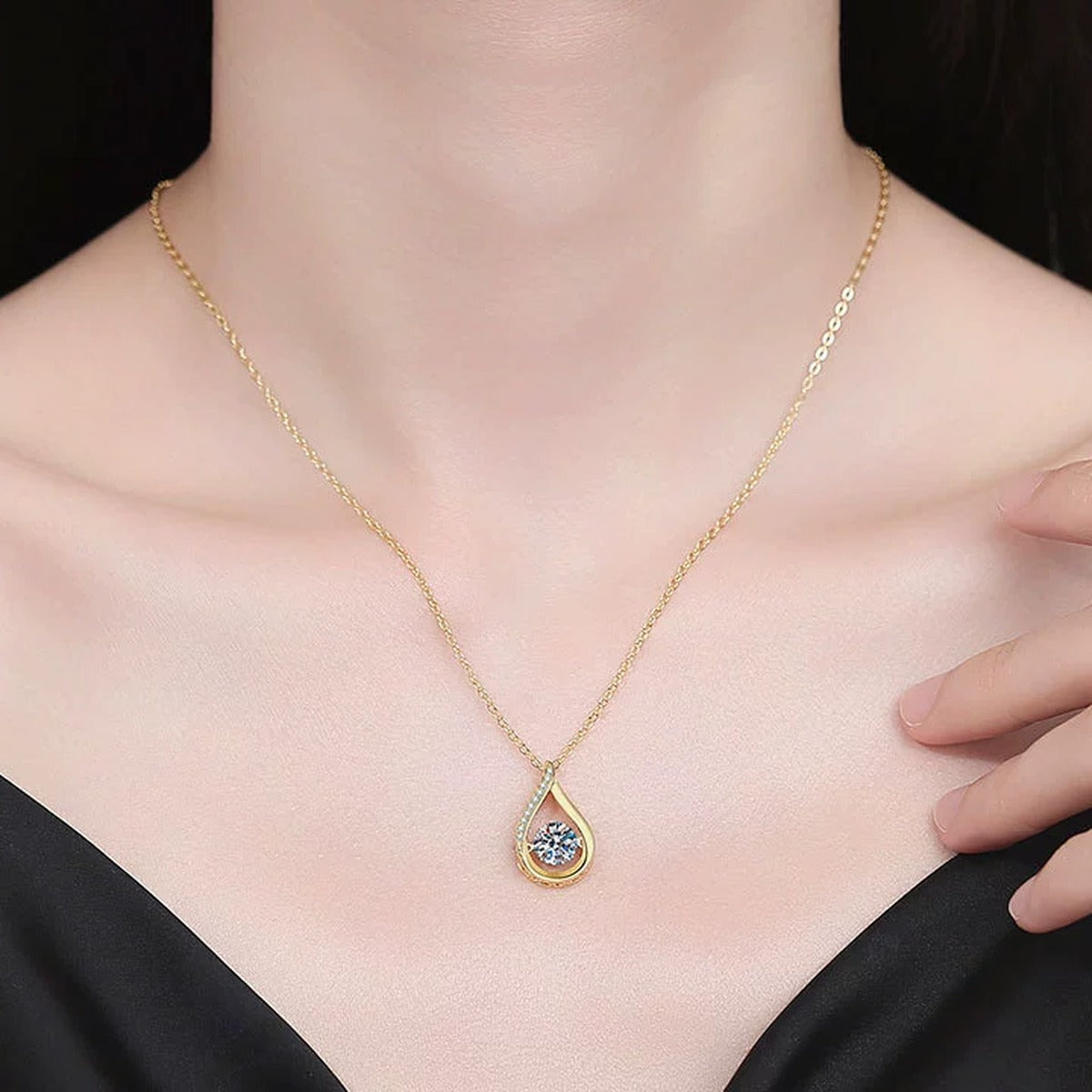 Teardrop Moissanite Pendant Necklace with Cubic Zirconia in 18K Yellow Gold-Plated S925 Sterling Silver worn on neckline by model