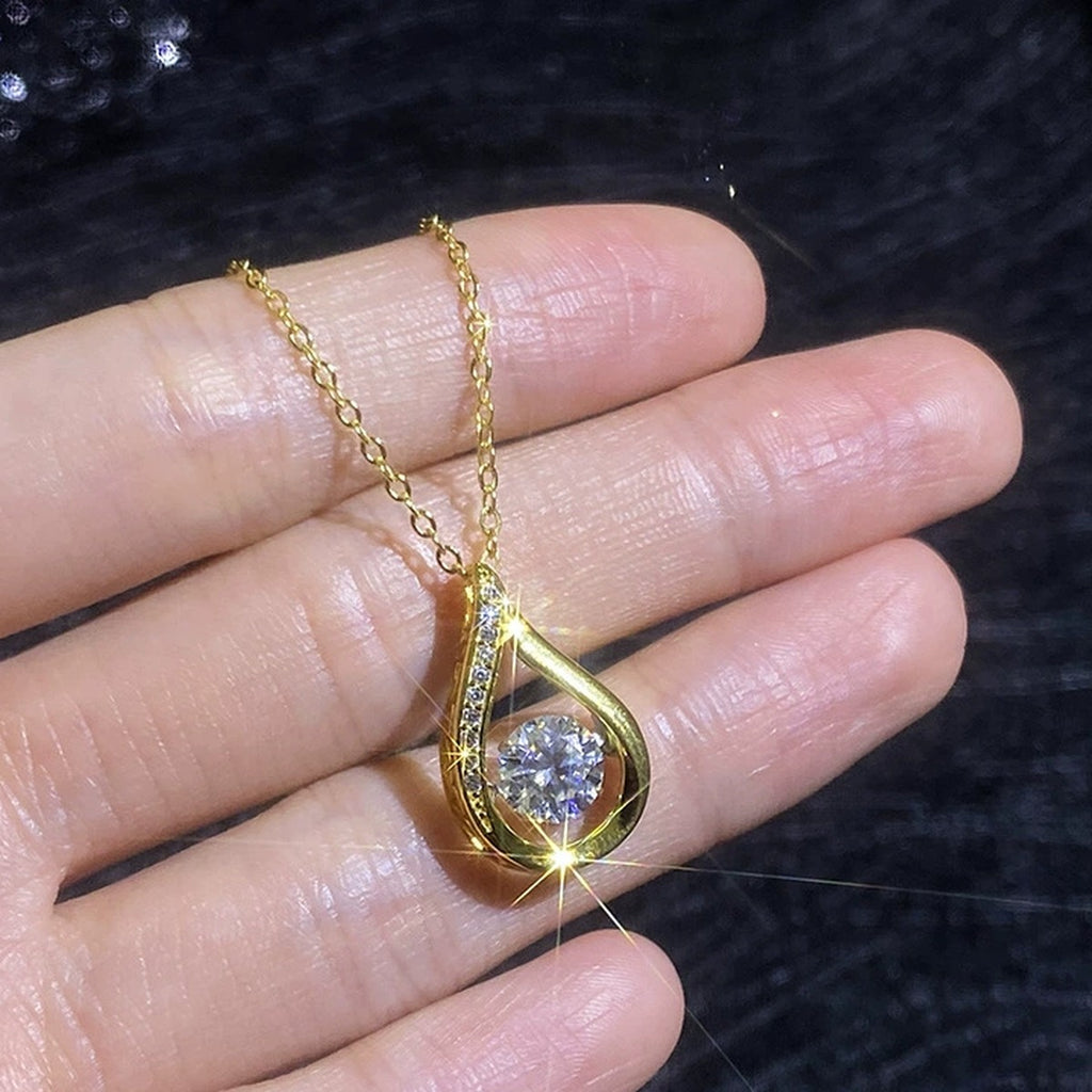 Teardrop Moissanite Pendant Necklace with Cubic Zirconia in 18K Yellow Gold-Plated S925 Sterling Silver worn on neckline by model