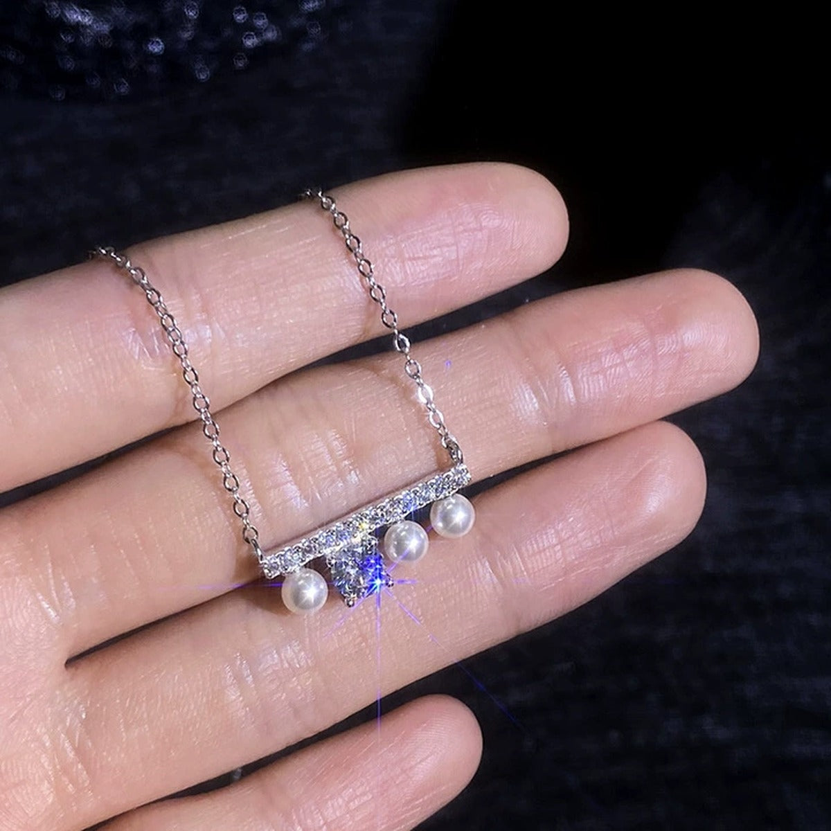 Pearl Moissanite Bar Necklace with Cubic Zirconia in Platinum-Plated S925 Sterling Silver worn on neckline by model