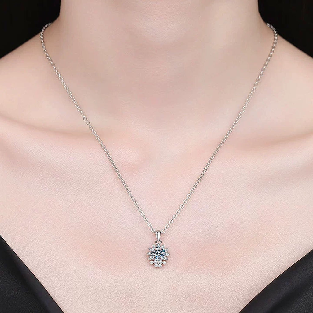 Snowflake Moissanite Pendant Necklace with Cubic Zirconia in Platinum-Plated S925 Sterling Silver worn on neckline by model