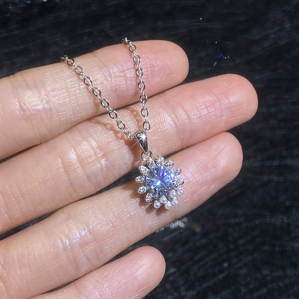 Snowflake Moissanite Pendant Necklace with Cubic Zirconia in Platinum-Plated S925 Sterling Silver worn on neckline by model