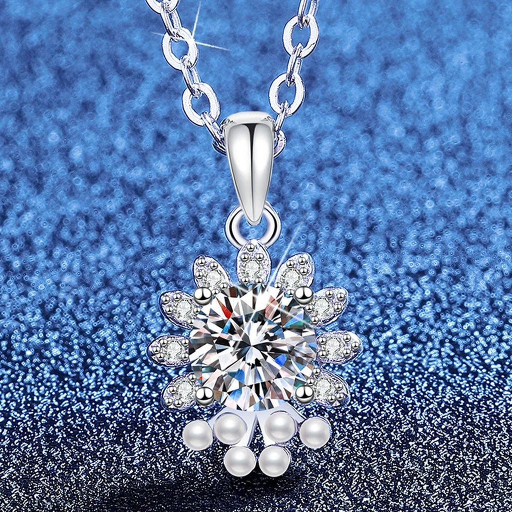 Snowflake Moissanite Pendant Necklace with Cubic Zirconia in Platinum-Plated S925 Sterling Silver blue background angled view