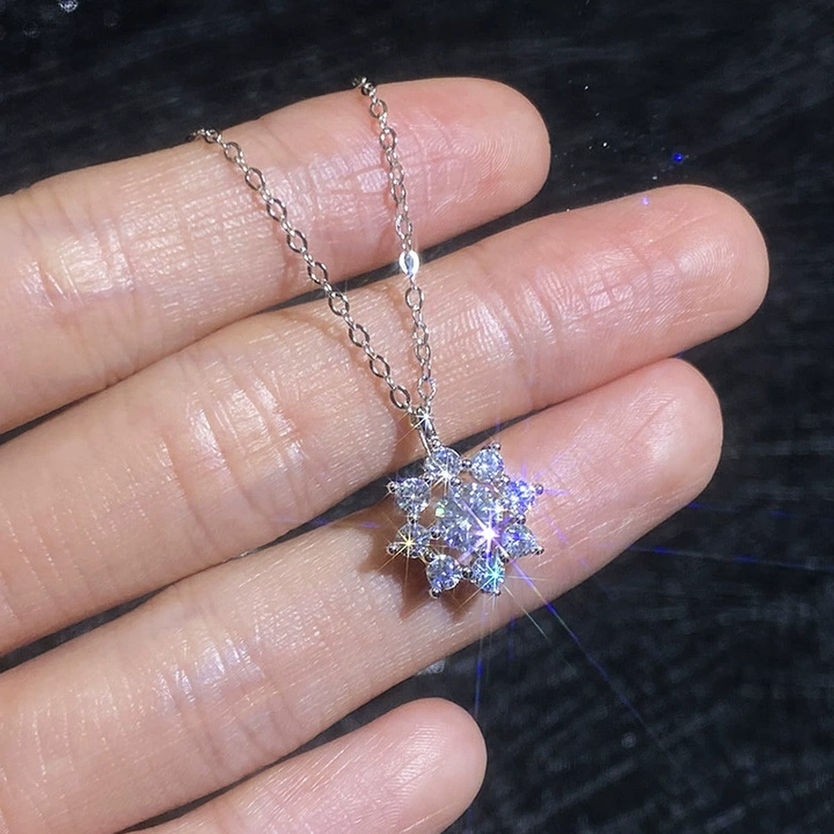 Knot Moissanite Pendant Necklace with Cubic Zirconia in Platinum-Plated S925 Sterling Silver worn on neckline by model