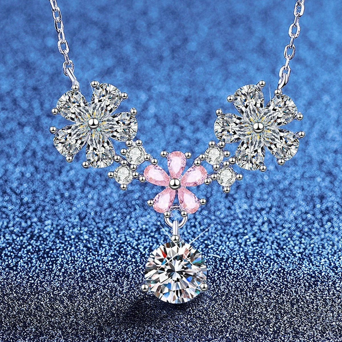 Floral Moissanite Pendant Necklace with Pink Cubic Zirconia in Platinum-Plated S925 Sterling Silver blue background product view