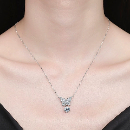 Butterfly Moissanite Pendant Necklace with Cubic Zirconia in Platinum-Plated S925 Sterling Silver worn on neckline by model