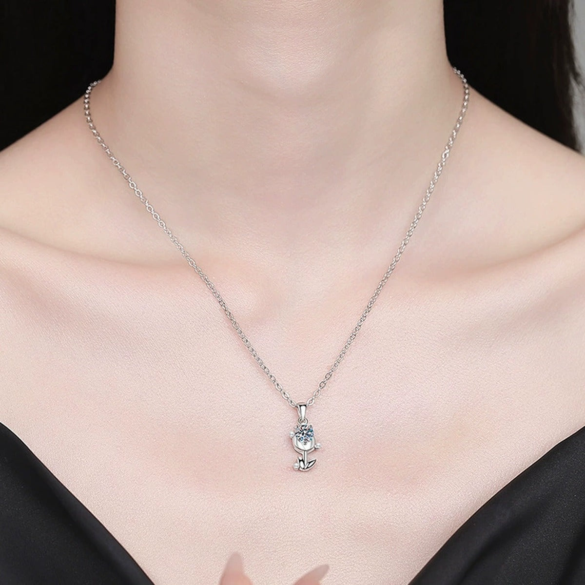 Anchor Moissanite Pendant Necklace with Cubic Zirconia and Pearl in Platinum-Plated S925 Sterling Silver worn on neckline by model