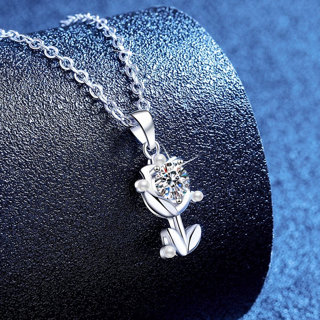 Anchor Moissanite Pendant Necklace with Cubic Zirconia and Pearl in Platinum-Plated S925 Sterling Silver blue background angled view
